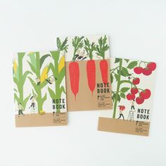 four notebooks with illustrated vegetables on them