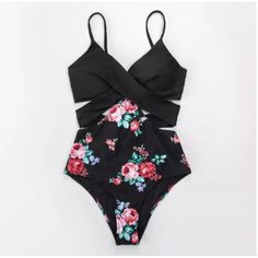 Cupshe Women's Floral Cutout V-Neck One-Piece Swimsuit Black Size Small A Floral Pattern And Cutout Design Makes This Women's Cupshe Swimsuit An Eye-Catching Choice. Product Features - Tummy Slimmer - Floral Print - Cutout Design - V-Neck Fit & Sizing - Removable Bra Cups - Adjustable Straps - Back-Hook Closure - Tie-Back Strap Detail - Medium-Impact Fabric & Care - Shell: Chinlon, Spandex - Lining: Polyester, Spandex - Hand Wash - Imported Summer Black Cutout Bodysuit, Black Floral Print Swimwear For Party, Black One-piece Swimwear With Floral Print, Black Floral Print One-piece Swimwear, Black V-neck Summer Bodysuit, Black V-neck Swimwear For Spring, Black V-neck Swimwear, Black Cutout Bodysuit For Spring, Spring Black Cutout Bodysuit