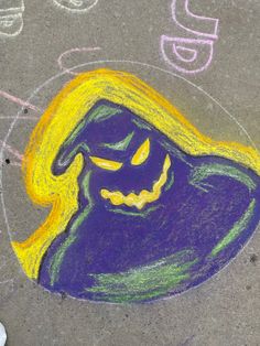 a child's chalk drawing of a witch on the sidewalk with words go g