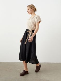 "Romantic feminine linen skirt with a trendy retro look of 50s. The skirt is cut on the bias so it drapes beautifully and falls at your mid calf. Such cut requires lots of fabric but allows creating a tight waistline with a wide draped bottom. An optical trick that would make your waist and hips look thinner. This skirt include ease and polish, feminity and practicality. Style it with sweaters or elegant blouses, heels or rugged boots. ABOUT US LINEN ID was born from desire to embrace things tha Linen Wrap Top, Long Linen Skirt, Skirt Flowy, Skirt A Line, Rugged Boots, Mode Kimono, Bias Cut Skirt, Boho Skirts, Elegant Blouses