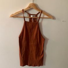 Out From Under Ribbed Tank Top A Burnt Orange/Brown/ Red Color. Small Bought From Urban Outfitters Great Condition, Never Worn Casual. Contemporary. Ripped. Unique. Party. Nightlife. Artsy. Vintage. Retro Smoke Free Household Bundle For Great Deals And Savings On Shipping Yellow Halter Top, Urban Outfitters Tank Top, Party Tank Top, Urban Outfitters Top, White Bohemian, Black Sheer Top, Purple Tank Top, High Neck Tank Top, Purple Tank