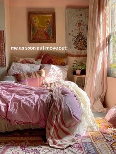 a bed with pink sheets and pillows in a bedroom next to a window that says me as soon as i move out