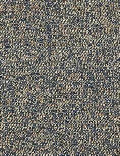 an upholstered blue and beige carpet with small speckles