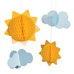 three paper sun and cloud decorations hanging from strings