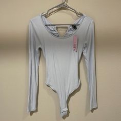 Brand New Condition. Super Cute And Pairs Wonderfully With Both Jeans And Skirts. Says Xs But Can Fit A M. Price Is Negotiable. Comment For Measurements! Trendy Blue V-neck Bodysuit, Chic Blue Stretch Bodysuit, Casual Backless Bodysuit For Spring, Casual Backless Spring Bodysuit, Chic Blue Bodysuit For Spring, Light Blue Stretch Bodysuit, Blue Backless Bodysuit For Night Out, Casual Blue Bodysuit For Night Out, Spring Casual Bodysuit For Brunch