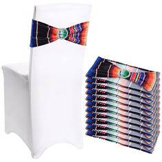 a stack of white chairs with colorful ties on them and one chair has a matching bow tie