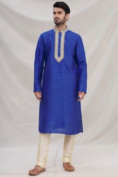 Buy Men's Art Dupion Silk Embroidered Kurta Set in Blue Online Embroidered Straight Kurta In Indigo, Embroidered Indigo Straight Kurta, Indigo Embroidered Straight Kurta, Traditional Indigo Embroidered Kurta, Traditional Embroidered Indigo Kurta, Festive Indigo Embroidered Kurta, Festive Embroidered Indigo Kurta, Blue Kurta With Zari Work For Traditional Ceremonies, Indigo Traditional Wear With Chikankari Embroidery And Long Sleeves