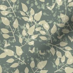 a green and white wallpaper with leaves on the back drop in shades of grey