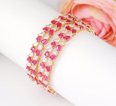 Luxurious Look diamond Ruby stone studded high quality gold plated bangles at an unimaginable price! Available in 2.8 Size Gold Bangle Designs, Gold Plated Bangles, Gold Bangles Design, Bangles Style, Bangle Designs, Ruby Stone, Stone Studs, Gold Bangle, Stone Gold