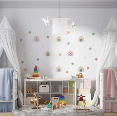 a child's bedroom with white walls and rainbow wall decals on the walls