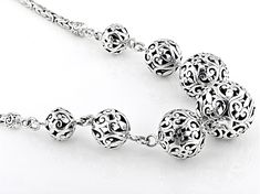 Artisan Collection of Bali™ Sterling Silver Ball Station Necklace. Measures Approximately 16"L x 0.67"W. Toggle Closure with a 0.50" extender. Oxidized. Elegant Adjustable Necklace With Oxidized Finish, Artistic Jewelry With Intricate Design For Gift, Adjustable Round Necklace With Intricate Design, Adjustable Round Necklaces With Intricate Design, Artisan Metal Jewelry For Formal Occasions, Artistic Adjustable Formal Jewelry, Artistic Oxidized Finish Jewelry, Elegant Oxidized Finish Dangle Necklaces, Elegant Oxidized Dangle Necklace