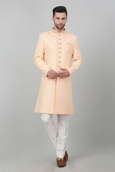 Peach cotton sherwani with all over floral checkered pattern, tonal thread, sequin embroidery and bead work mandarin collar. Paired with kurta and straight fit pant. - Aza Fashions Designer Pink Sherwani, Designer Cotton Fitted Sherwani, Designer Fitted Cotton Sherwani, Designer Cotton Sherwani With Chikankari Embroidery, Designer Cotton Sherwani With Straight Kurta, Designer Cotton Sherwani For Festive Occasions, Elegant Formal Cotton Sherwani, Designer Cotton Sherwani For Wedding, Fitted Cotton Sherwani With Traditional Drape