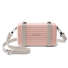 Pre-order from 11/19 Made in Germany and crafted in ultra-lightweight, dent-resistant grooved polycarbonate, the RIMOWA Personal in Desert Rose Pink is a unisex hard-shell crossbody bag meant to house and transport your daily personal essentials. It can be worn with the detachable, adjustable leather body strap or carried like a clutch. Each detail of the RIMOWA Personal in Desert Rose Pink is carefully considered from its color-matched straps and leather lining down to its metal rivets, rings, Cross Bag, Desert Rose, Cool Suits, White Bag, Rose Pink, Full Grain Leather, Body Bag, Italian Leather, Pink Roses