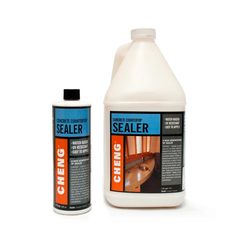 a bottle of sealer next to a gallon of cleaner