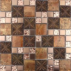 an artistic tile design with many different colors and patterns on it's surface, including brown