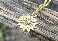 Sunflower Necklace. Choose Your Color. Gift For Wedding, Bridesmaids, Kids, Anniversary, Birthday, Christmas. by TreeTownPaper on Etsy Sunflower Design Flower Jewelry For Anniversary, Sunflower Design Jewelry For Anniversary, Wedding Jewelry With Sunflower Design, Anniversary Gold Jewelry With Sunflower Design, Yellow Sunflower Print Jewelry For Gift, Yellow Sunflower Print Jewelry As Gift, Yellow Sunflower Print Jewelry Gift, Mother's Day Sunflower Design Jewelry, Yellow Gold Jewelry With Sunflower Design As Gift