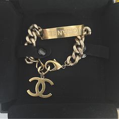 Gold Plated Chunky Chain Bracelet With “Chanel” Imprinted On Plate. Has A Lobster Clasp Therefore It Is Adjustable. Has A Large Cc That Hangs From The End Of Bracelet When Clasped. It Is Stunning. Remains Vibrant. Slight Sense Of Use With Superficial Scratches Throughout As Seen However Remains In Very Good Condition And Gold Is Vibrant. Comes In Pouch And Box. Authenticated, However Posh Will Authenticate In House On Purchases Over $500. Hard To Come Across In This Condition. It Is Gorgeous!!! Jewelry Chanel, Chanel Jewelry, Back Plate, Womens Jewelry Bracelets, Chain Bracelet, Lobster Clasp, Dip, Gold Plate, Sense