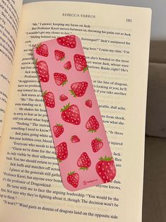 a bookmark with strawberries printed on it