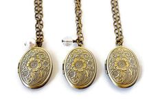 "Flower Gold Locket Necklace - Bohemian Floral Oval Locket - Vintage Photo Locket - Personalize Gift for Her . . . Beautiful bohemian etched style carved rose floral and vine antique gold brass oval flower locket necklace. There is plenty of room inside this beautiful Victorian inspired locket necklace for your favorite photos, or your secret message. This lightweight locket pendant suspends from hypoallergenic high quality soldered oval link antique gold brass electroplated chain and fastens wi Elegant Personalized Flower Pendant Locket Necklace, Bohemian Gold Locket Necklace With Vintage Charm, Gold Bohemian Locket Necklace With Vintage Charm, Elegant Handmade Antique Gold Locket Necklace, Elegant Flower Pendant Locket Necklace For Keepsakes, Elegant Locket Necklace With Flower Charm As Gift, Brass Locket Necklace With Flower Pendant, Brass Flower Pendant Locket Necklace, Elegant Handmade Bronze Locket Necklace