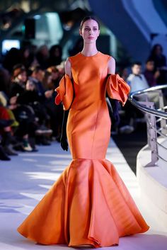 Description Orange Fitted through knees, Long dress Sleeveless Closed neckline Dry Clean Made in Spain SKU BOISSANO Isabel Sanchis, High Neck Gown, Peplum Gown, Combination Dresses, Dress With Gloves, Orange Fits, Off Shoulder Gown, Trumpet Dress, African Lace Dresses