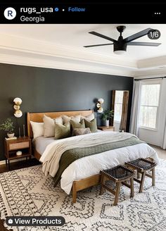 a bed room with a neatly made bed and a ceiling fan