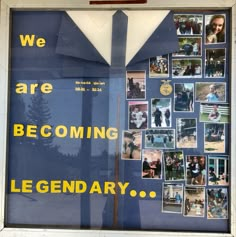 there is a window display with pictures and words in the front, along with a sign that says we are becoming legendary