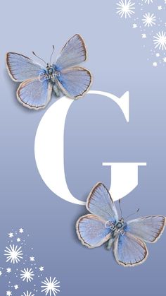 two butterflies flying over the letter c on a blue background