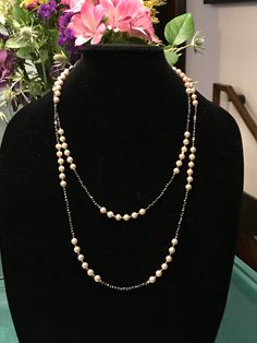 "This piece was designed to copy an actual necklace worn by Lady Mary in the PBS series Downton Abbey. This necklace is 50\" of glittering faceted gold natural iron pyrite beads interspersed with mint condition 6mm vintage cream faux Majorca pearls OR genuine AAA freshwater pearls (choose when you checkout). This is a VERY long necklace; it measures 50\" total from top to bottom. It can be worn as one long necklace (if you're tall or channeling your inner flapper) but it's also meant to be loope Classic Long Evening Necklace, Classic Long Necklace For Evening, Elegant Double Strand Beaded Chain Necklace, Elegant Handmade Custom Necklace For Formal Occasions, Long Beaded Chain Necklace For Evening, Elegant Handmade Formal Custom Necklace, Evening Long Necklace With Beaded Chain, Evening Costume Jewelry Necklace With Faceted Beads, Elegant Double Strand Evening Jewelry