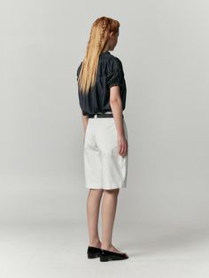 BURMULA is a contemporary brand based in Seoul, dedicated to combining curved silhouettes, unique details, and innovative materials. Our collections are designed to seamlessly blend with tailored pieces and everyday essentials, embodying a refined aesthetic sensibility.- Introducing low-rise, balloon-fit denim pants with a cropped length.- Crafted from sturdy non-stretch cotton material with a tactile feel from a normal washing process.- Unique seam details on both the front and back panels.- Features logo embroidery on one of the back pockets.- Utilizes nickel matte-toned rivets with embossed logos. Modern Structured Bottoms For Spring, Modern Structured Office Bottoms, Embossed Logo, Embroidery Logo, Stretch Cotton, Cotton Material, Denim Pants, Everyday Essentials Products, White