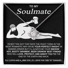 a necklace with the words to my soulmate and an image of a woman laying on her stomach