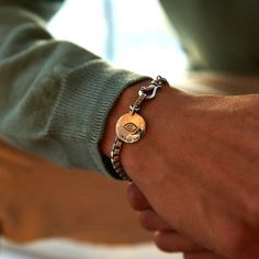 Our slender box chain bracelet is made from sleek sterling silver and secured with a hinged hook for added elegance. But the real treasure? A smooth coin embossed with an eye motif designed to ward off evil spirits. #materials sterling silver, 4mm wide, Handcrafted, Designed in NYC Timeless Silver Chain Bracelet, Tarnish Resistant, Timeless Tarnish Resistant Silver Chain Bracelet, Timeless Silver Tarnish-resistant Chain Bracelet, Timeless Tarnish-resistant Silver Chain Bracelet, Adjustable Sterling Silver Chain Bracelet, Tarnish Resistant, Tarnish Resistant Sterling Silver White Gold Chain Bracelet, Sterling Silver White Gold Chain Bracelet, Tarnish Resistant White Gold Sterling Silver Bracelet, Timeless Engraved Sterling Silver Bracelet