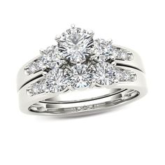 a white gold ring with two diamonds on it