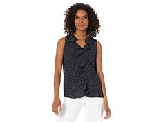 Vince Camuto Sleeveless V-Neck Ruffle Front Pindot Blouse - Women's Clothing : Rich Black : Look cute and classic wearing the Vince Camuto Sleeveless V-Neck Ruffle Front Pindot Blouse. Regular fit. V-neckline and sleeveless construction. Ruffle detailing on the neck and center-front. Straight hem. Allover polka dot print. 100% polyester. Machine washable. Imported. Measurements: Length: 24 in Product measurements were taken using size SM. Please note that measurements may vary by size. Sleeveless Polka Dot Top For Work, Polka Dot Sleeveless Top For Work, Polka Dot Ruffled V-neck Top, Polka Dot V-neck Top With Ruffles, Elegant Sleeveless Polka Dot Top, Black Look, Neck Ruffle, Polka Dot Print, Dot Print