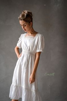 "This design linen dress is perfect for summer and fall! 100 % designed and handmade by Emsilk. I am pleased to offer your garments made to measure at no extra cost. * Detail: - Square neckline with lace - gathered waist with lace - Fit and flare bottom - Fully lined - Invisible zipper on the back - Mid-calf length (send me a request on the length) - High quality linen, washed linen, soft linen - The model is 5'6\" tall and wearing size S. * Care: - Dry clean or machine washed with cold water se White Cotton Linen Dress With Square Neck, Linen Midi Dress For Wedding, Elegant Cotton Puff Sleeve Dress For Garden Party, Summer Daywear Vintage Dress With Puff Sleeves, Summer Vintage Puff Sleeve Dress For Daywear, Summer Wedding Puff Sleeve Midi Dress, Summer Wedding Midi Puff Sleeve Dress, Elegant Linen Midi Dress With Puff Sleeves, White Linen Square Neck Midi Dress