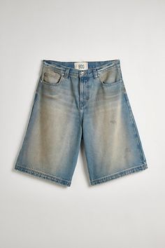 Oversized BDG baggy jorts in premium BDG denim. Longline denim shorts with a relaxed fit and zip fly. Urban Outfitters exclusive. Features BDG Astro baggy washed denim jorts Longline denim shorts Mid rise waist Rigid BDG denim Loose longline fit 5-pocket; zip fly UO exclusive Content + Care 100% Cotton Machine wash Imported Size + Fit Model in Dark Green 6'1.5" and wearing size 32 Measurements taken from size 32 Rise: 14" Inseam: 11.5" Leg opening: 12.5" | BDG Astro Baggy Washed Denim Jort in Li Streetwear Shorts With Five Pockets, Five-pocket Streetwear Shorts, Medium Wash Five Pocket Shorts For Streetwear, Medium Wash Five-pocket Shorts For Streetwear, Streetwear Short Length Jean Shorts With Five Pockets, Jean Shorts With Five Pockets For Streetwear, Denim Jorts, Urban Outfitters Jeans, Baggy Denim