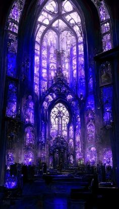 the inside of a gothic church lit up with purple lights