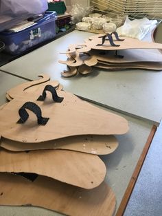 some wooden shapes are sitting on a table