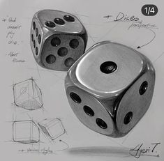 two metal dices on top of a white paper with some drawings in the background