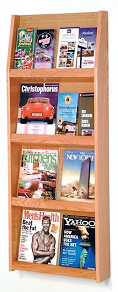 a wooden book shelf filled with books and magazines