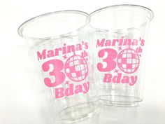 two plastic cups with the words marina's marina's 30th birthday printed on them