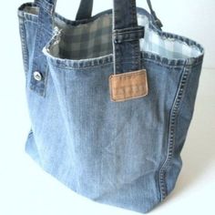 a denim bag with a pocket on the inside