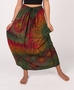 Bell Tie Dye Skirt in Mudmee Tie-Dye Bohemian Batik Print Beach Skirt, Green Hippie Maxi Skirt For Festival, Green Flowy Bohemian Bottoms, Bohemian Flowy Green Bottoms, Flowy Green Bohemian Bottoms, Hippie Tie-dye Skirt For Beach, Hippie Tie-dye Skirt For The Beach, Multicolor Relaxed Hippie Maxi Skirt, Hippie Style Multicolor Relaxed Maxi Skirt