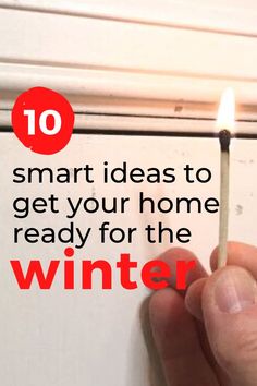 a hand holding a match with the words 10 smart ideas to get your home ready for the winter