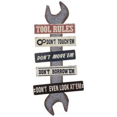 a metal sign that says tools rules don't move them don't even look at me