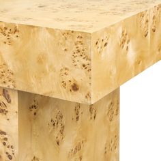 a close up of a wooden table with holes in the top and bottom part of it