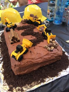 a chocolate cake with construction themed frosting