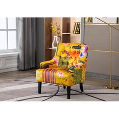 a brightly colored chair sitting on top of a rug