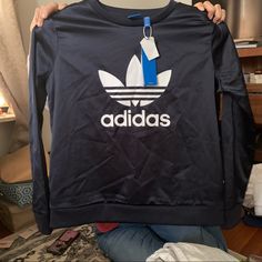 Size Medium Beautiful Satin Adidas Sweatshirt It Does Not Stretch Casual Navy Tops With Three Stripes Branding, Casual Crew Tops With Three Stripes Branding, Navy Sporty Sweatshirt For Spring, Navy Crew Neck Sweatshirt For Spring, Navy Adidas Sporty Top, Adidas Navy Sporty Tops, Navy Sporty Adidas Tops, Sporty Navy Adidas Tops, Casual Navy Adidas Top