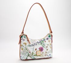 Sleek and sophisticated with a slim silhouette, this botanical baguette blooms with efflorescent style. From Dooney & Bourke. \n\nOriginal item is A641320. This product may be a customer return, vendor sample, or on-air display and is not in its originally manufactured condition. It may not be new. In some instances, these items are repackaged by QVC. Dooney & Bourke, Hobo Handbags, Jewelry Bags, Dooney Bourke, Fashion Handbags, Lookbook, Purse, Sleek, Handbags