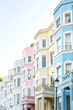 a row of multi - colored houses in san francisco, california